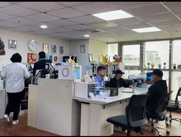 Twin Star staff at work in the agency office