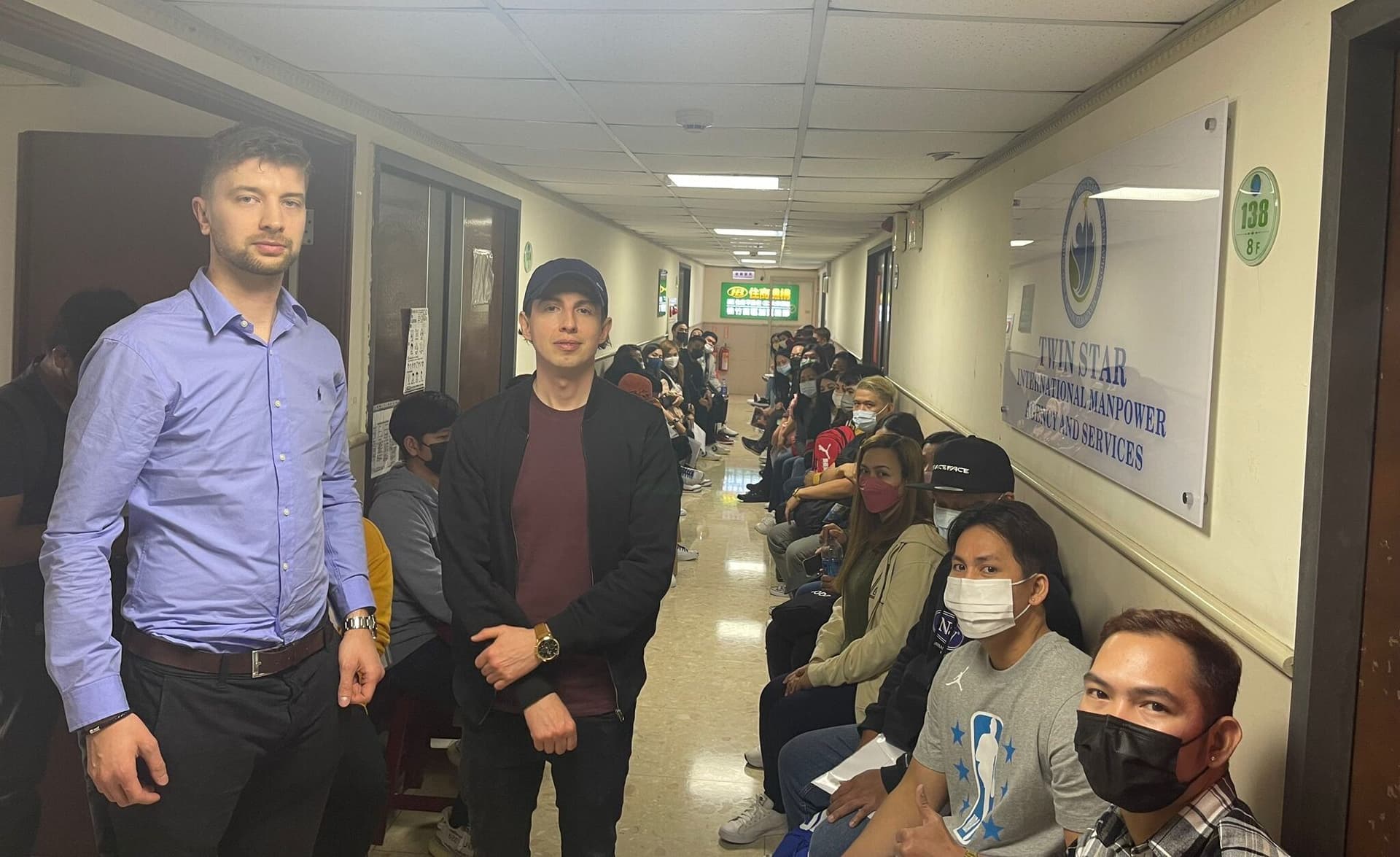 Applicants waiting at the Twin Star office in Taoyuan on a screening day